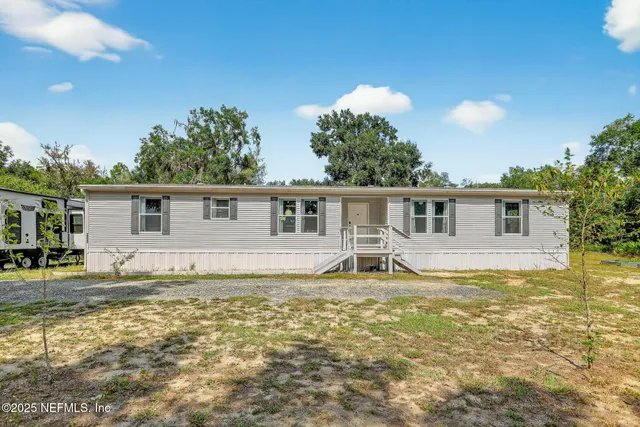 a view of a house with a swimming pool