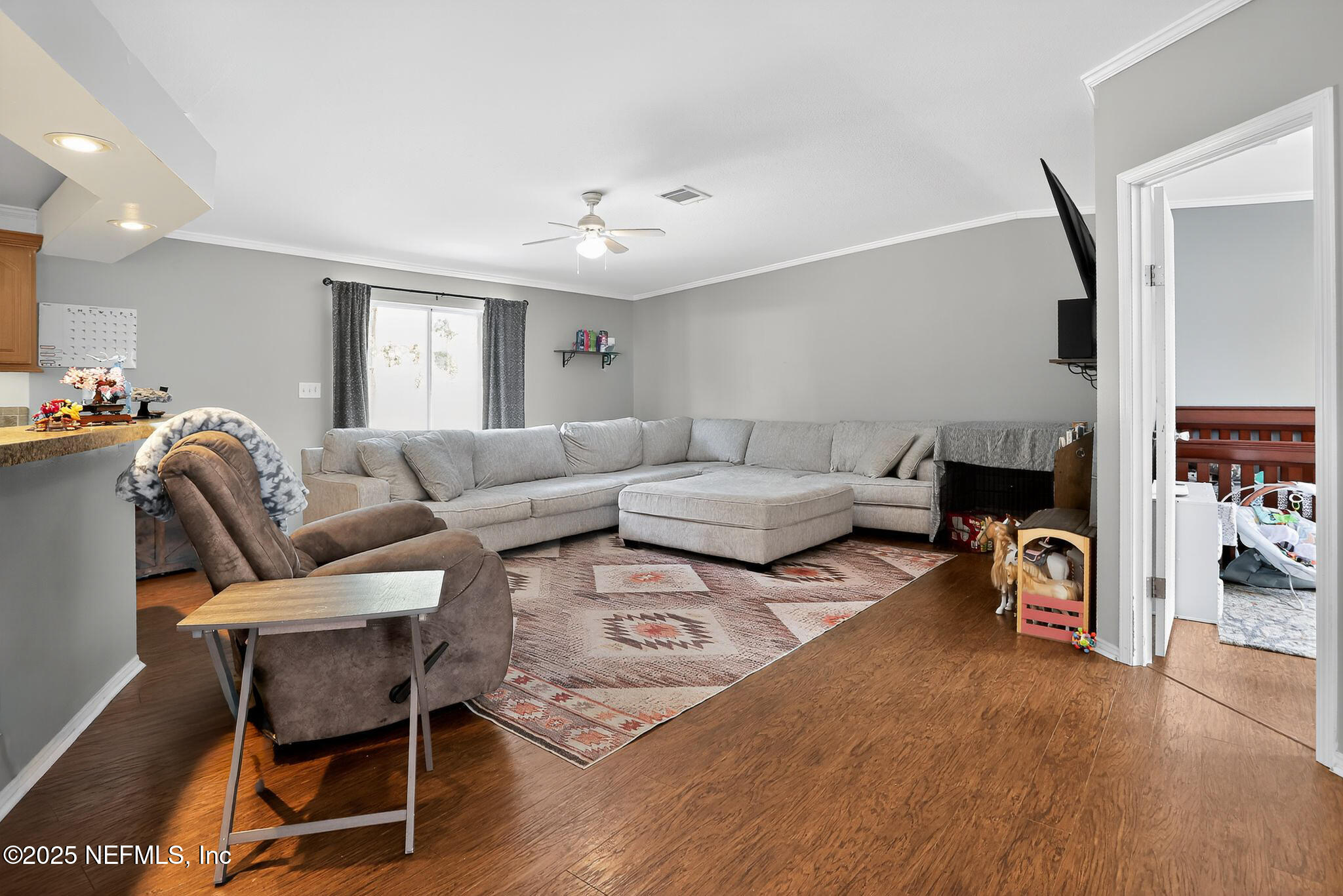 4824 Gadara Road Keystone Heights, FL 32656 - Photo 3 of 14 a living room with furniture and a wooden floor