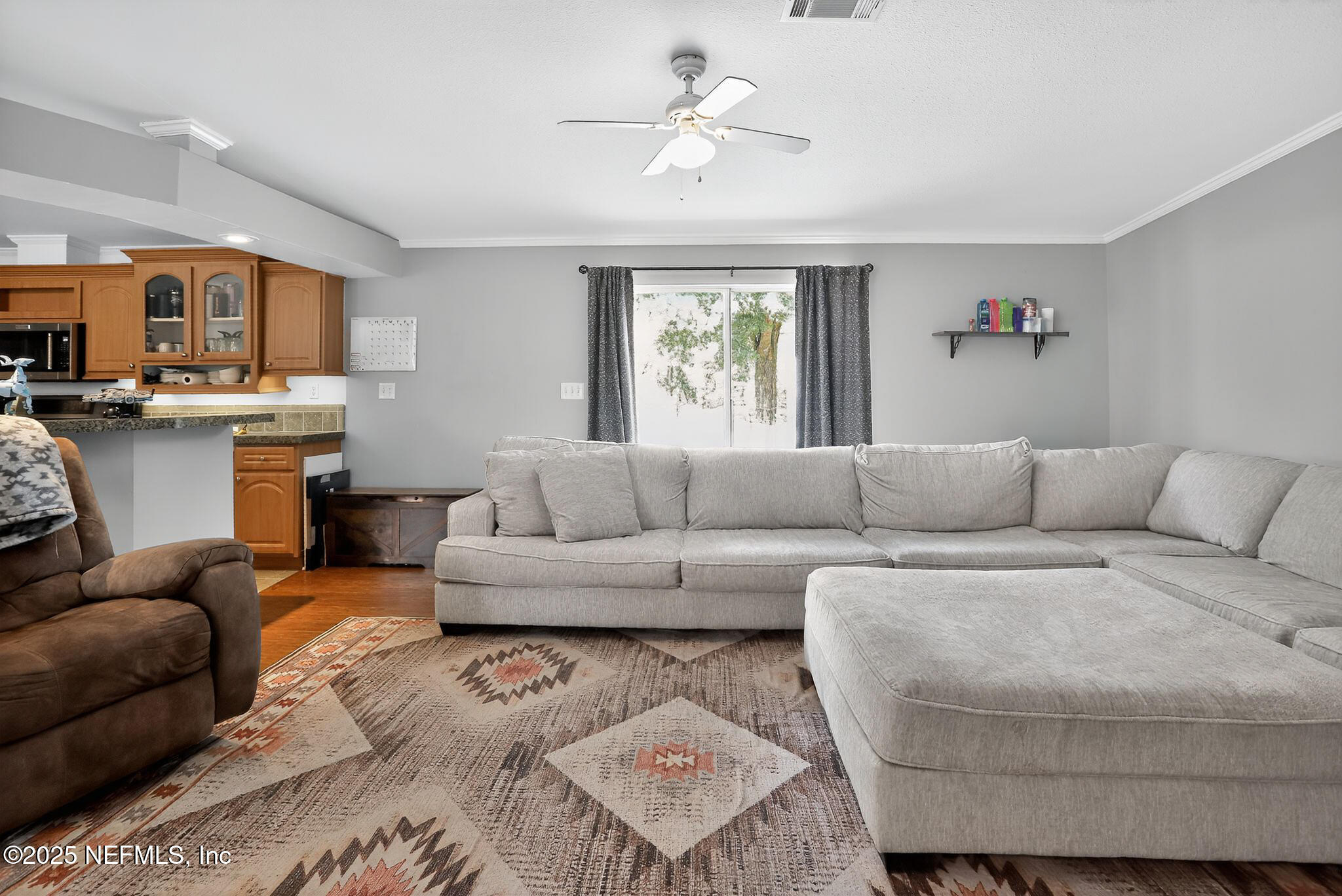 4824 Gadara Road Keystone Heights, FL 32656 - Photo 4 of 14 a living room with furniture and a window