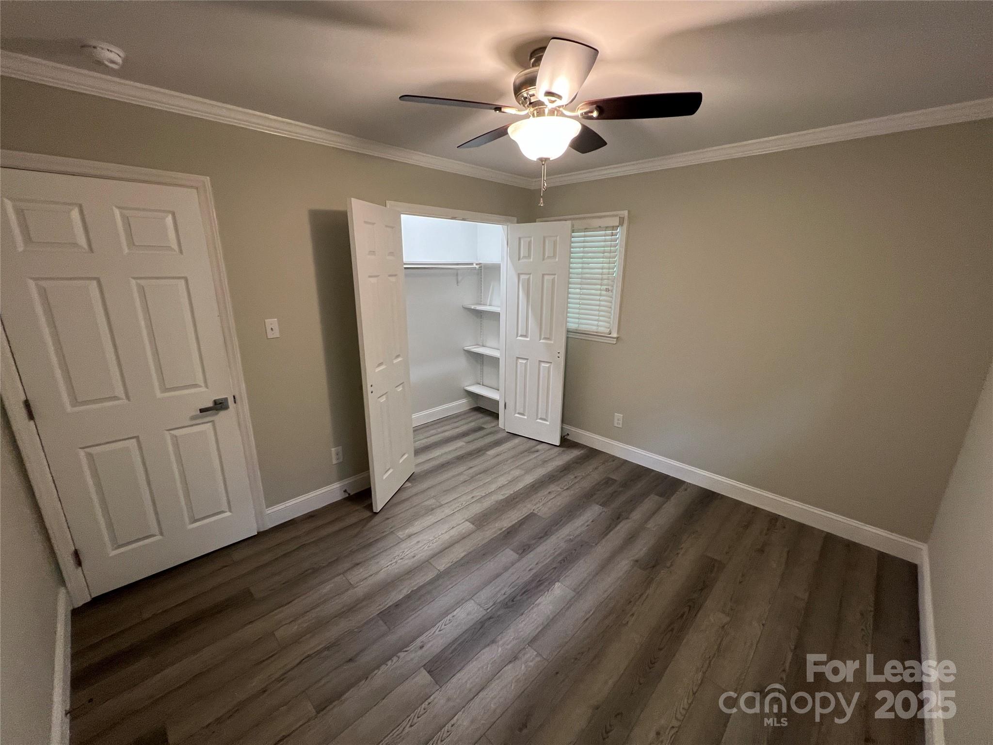 104 Secrest Avenue Belmont, NC 28012 - Photo 6 of 10 a view of an empty room with a window