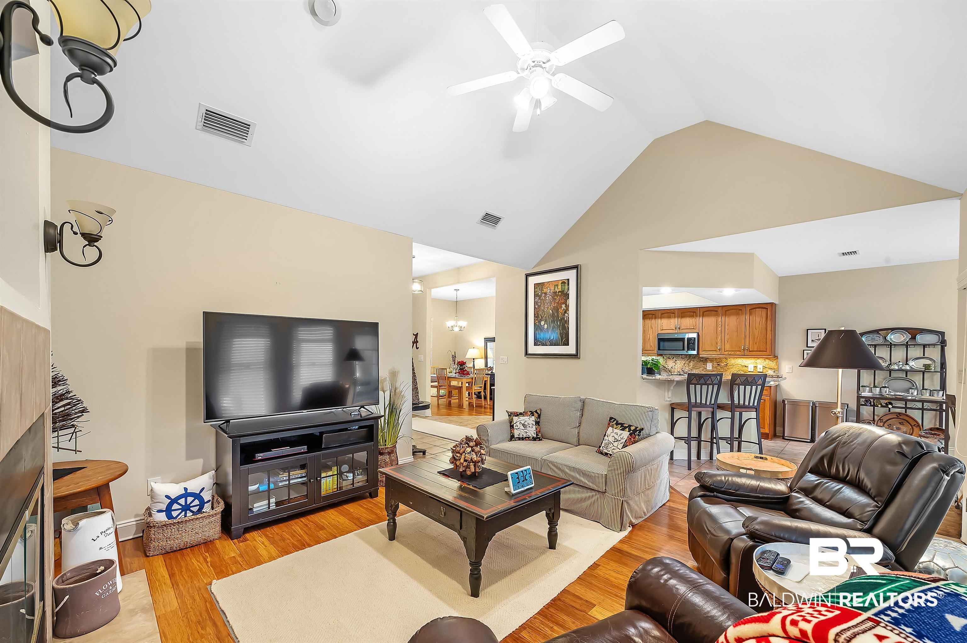 22726 Inverness Way Foley, AL 36535 - Photo 16 of 51 Living room featuring vaulted ceiling, light hardwood / wood-style flooring, and ceiling fan