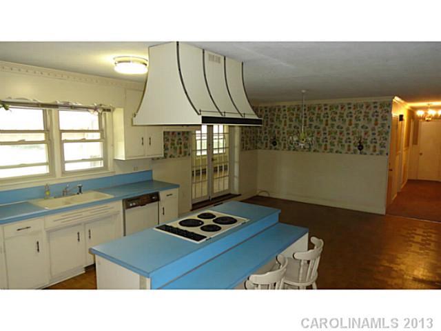 1031 George Brown Road Crouse, NC 28033 - Photo 6 of 16 a kitchen with a sink cabinets and window