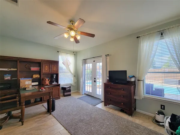 a view of an empty room with a window