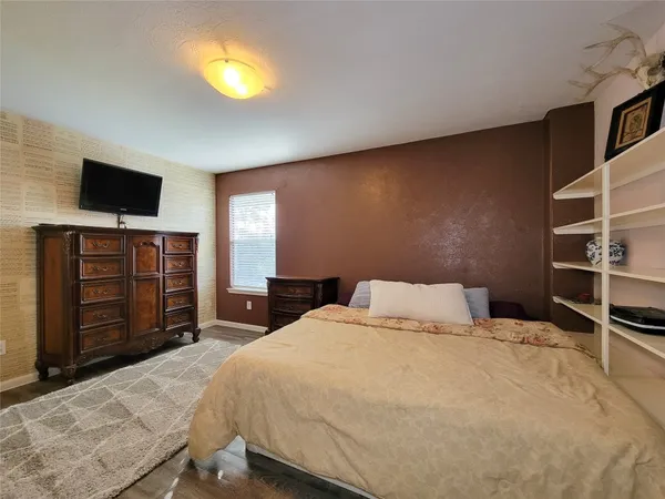 an aerial view of a house with outdoor space