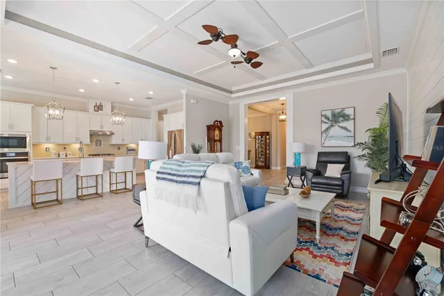 a large kitchen with stainless steel appliances granite countertop a stove a sink and a refrigerator