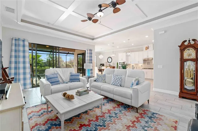 a view of a dining room with furniture and a window