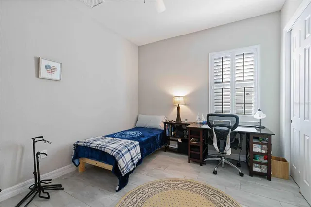 a view of an outdoor dining space with a table and chairs