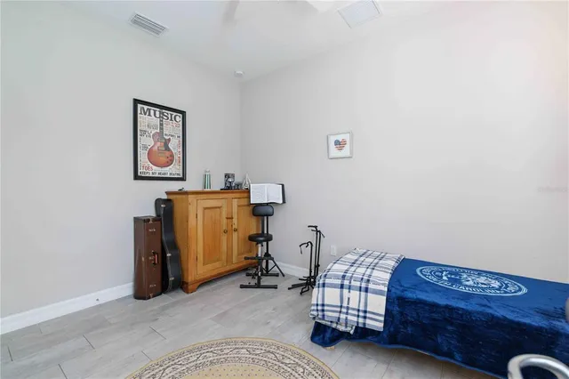 a view of a patio with a table chairs and a backyard