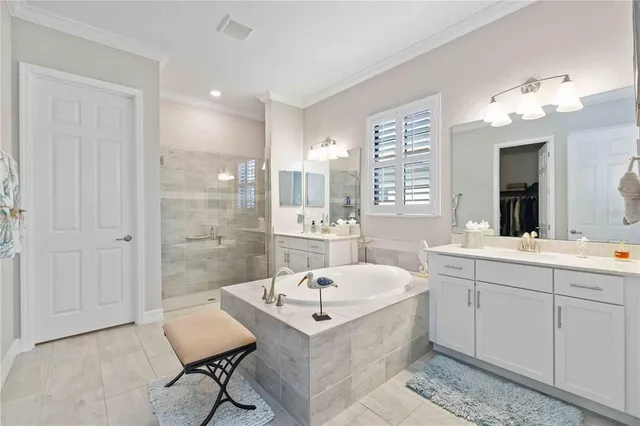 a view of a swimming pool with a lounge chairs