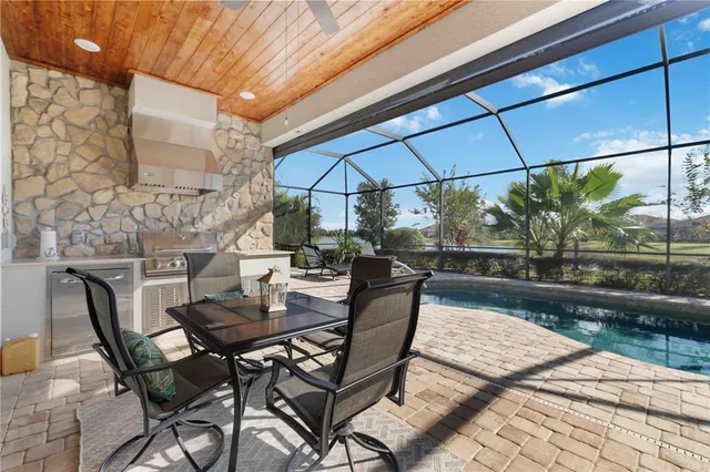 a front view of a house with a yard and a garage