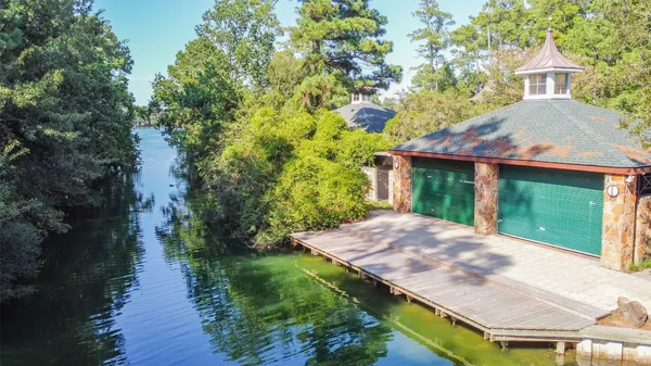 an aerial view of lake residential house with outdoor space