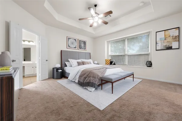 a large kitchen with stainless steel appliances granite countertop a large counter top a stove a sink and a refrigerator