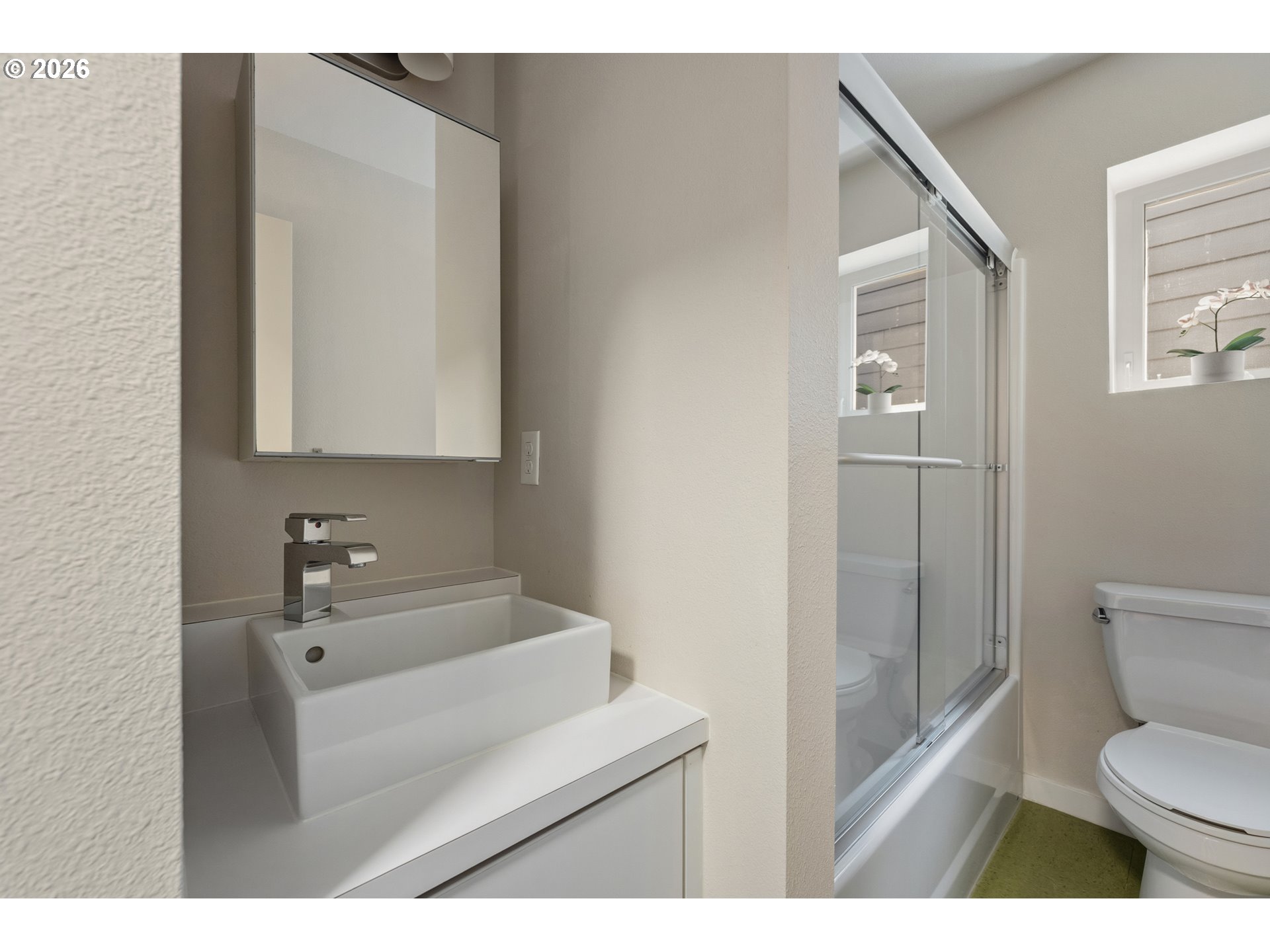 14794 Southwest Watershed Lane Beaverton, OR 97007 - Photo 28 of 46 a bathroom with a sink toilet and shower
