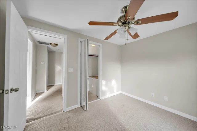 a bathroom with a sink toilet and a mirror