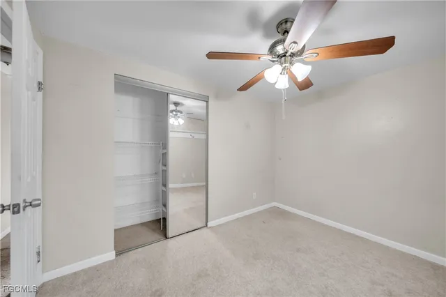 a view of a city with lush green forest