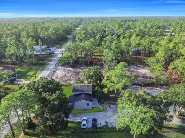 a view of a yard with an outdoor space
