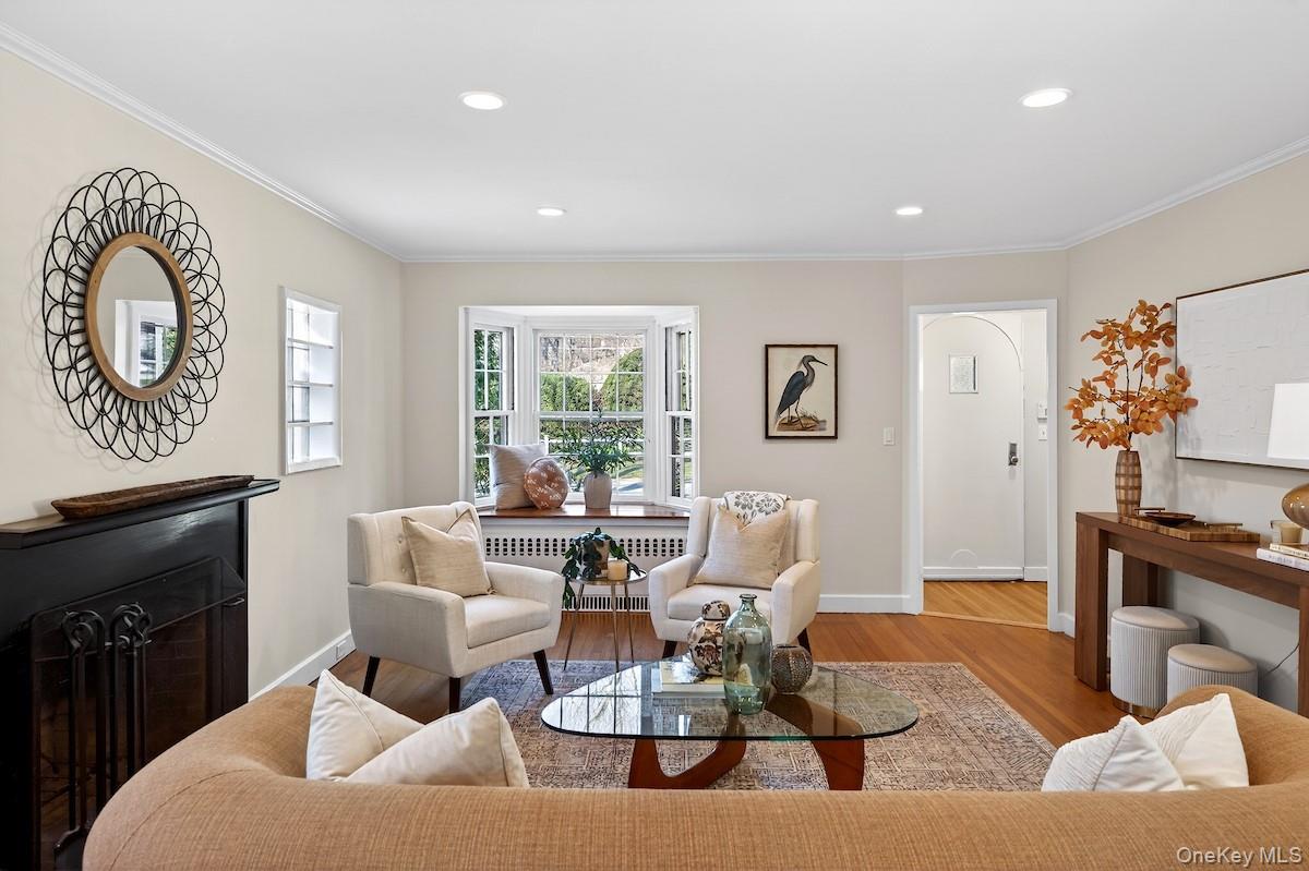 48 Fenwick Road Hastings-on-Hudson, NY 10706 - Photo 11 of 40 a living room with furniture and a flat screen tv
