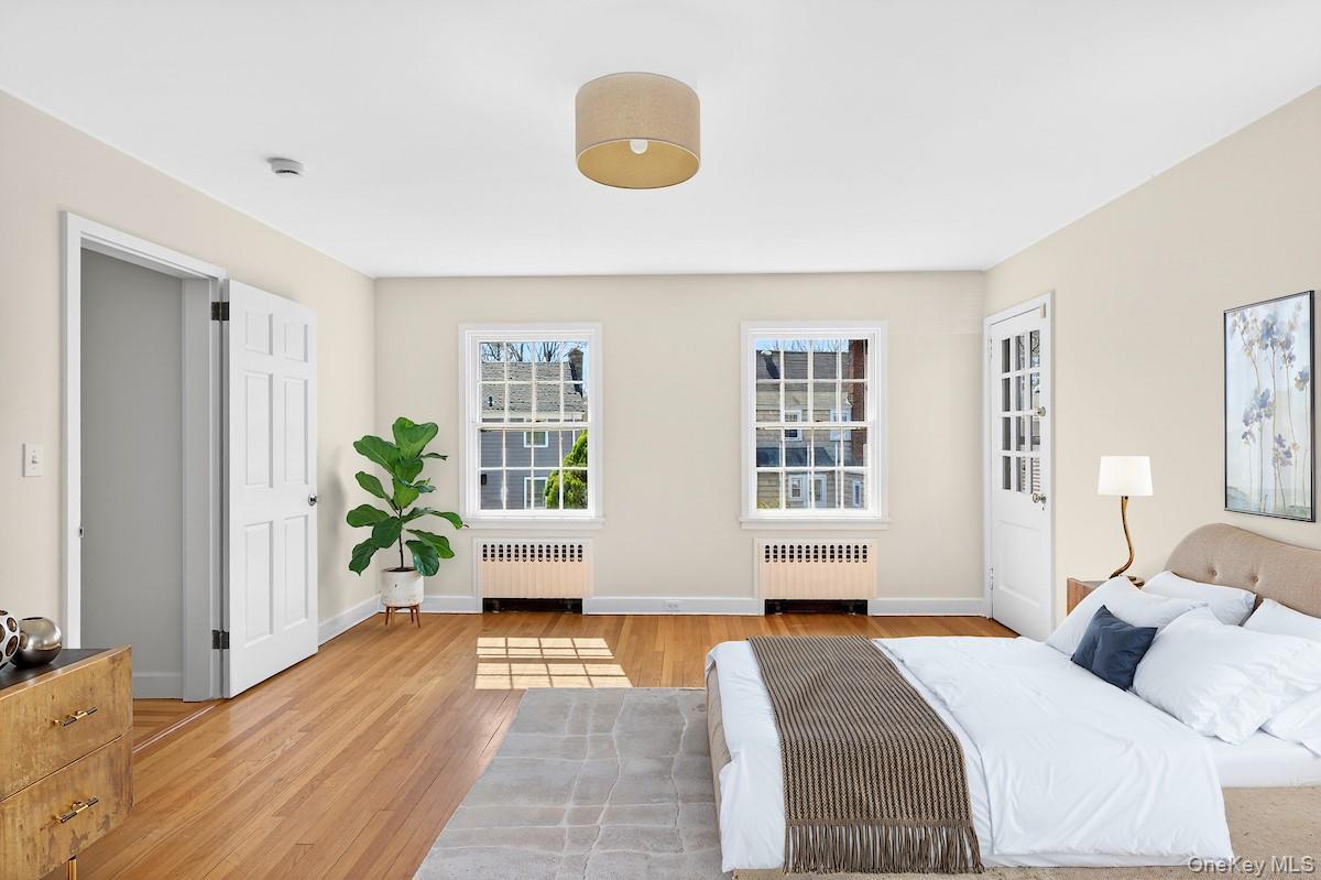 48 Fenwick Road Hastings-on-Hudson, NY 10706 - Photo 21 of 40 a bedroom with a bed and a window