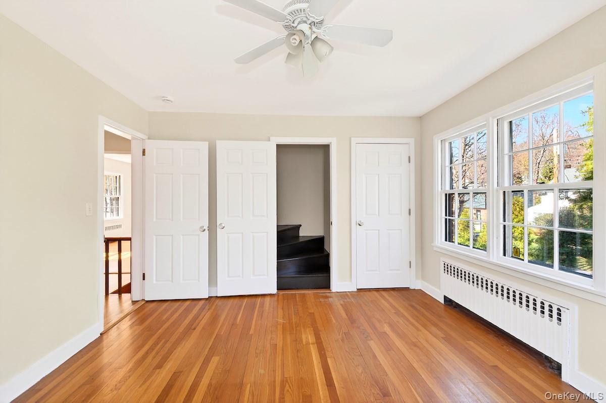 48 Fenwick Road Hastings-on-Hudson, NY 10706 - Photo 28 of 40 a view of an empty room with wooden floor and a window