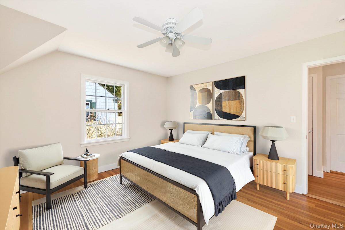 48 Fenwick Road Hastings-on-Hudson, NY 10706 - Photo 29 of 40 a bedroom with a bed couch and window