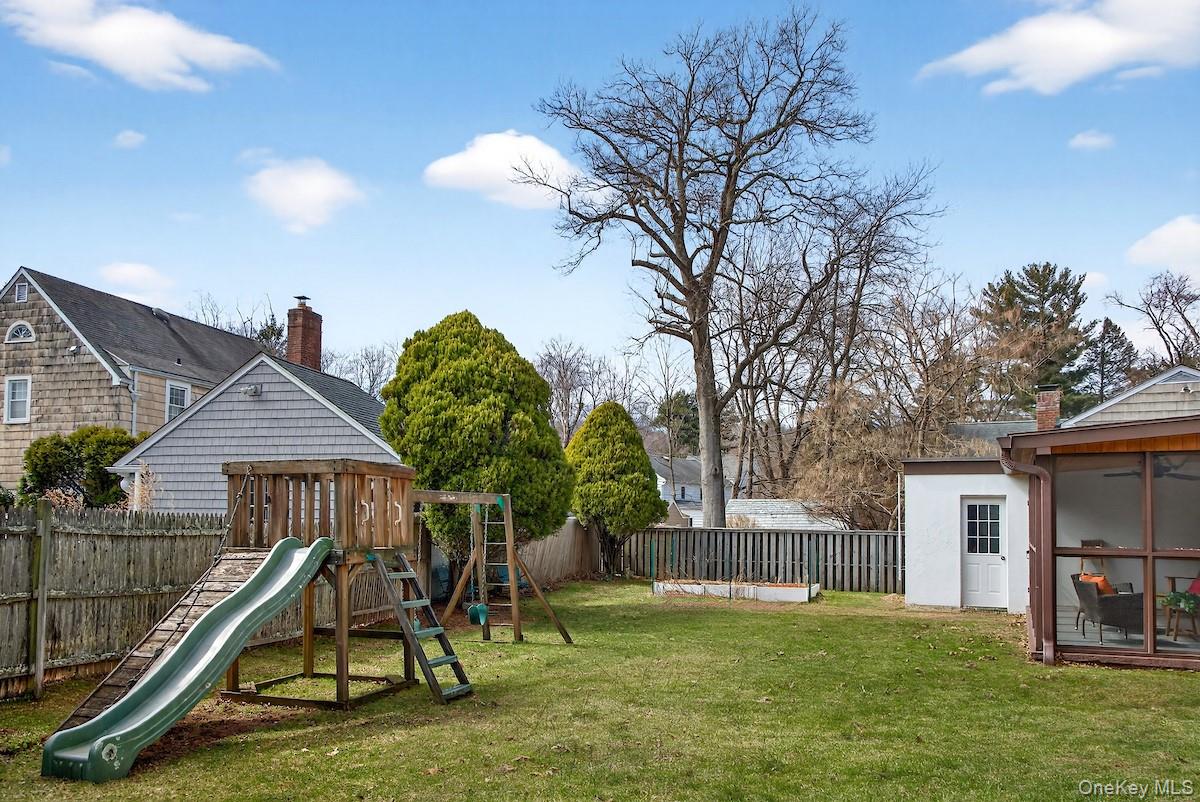 48 Fenwick Road Hastings-on-Hudson, NY 10706 - Photo 34 of 40 a house with garden in front of it