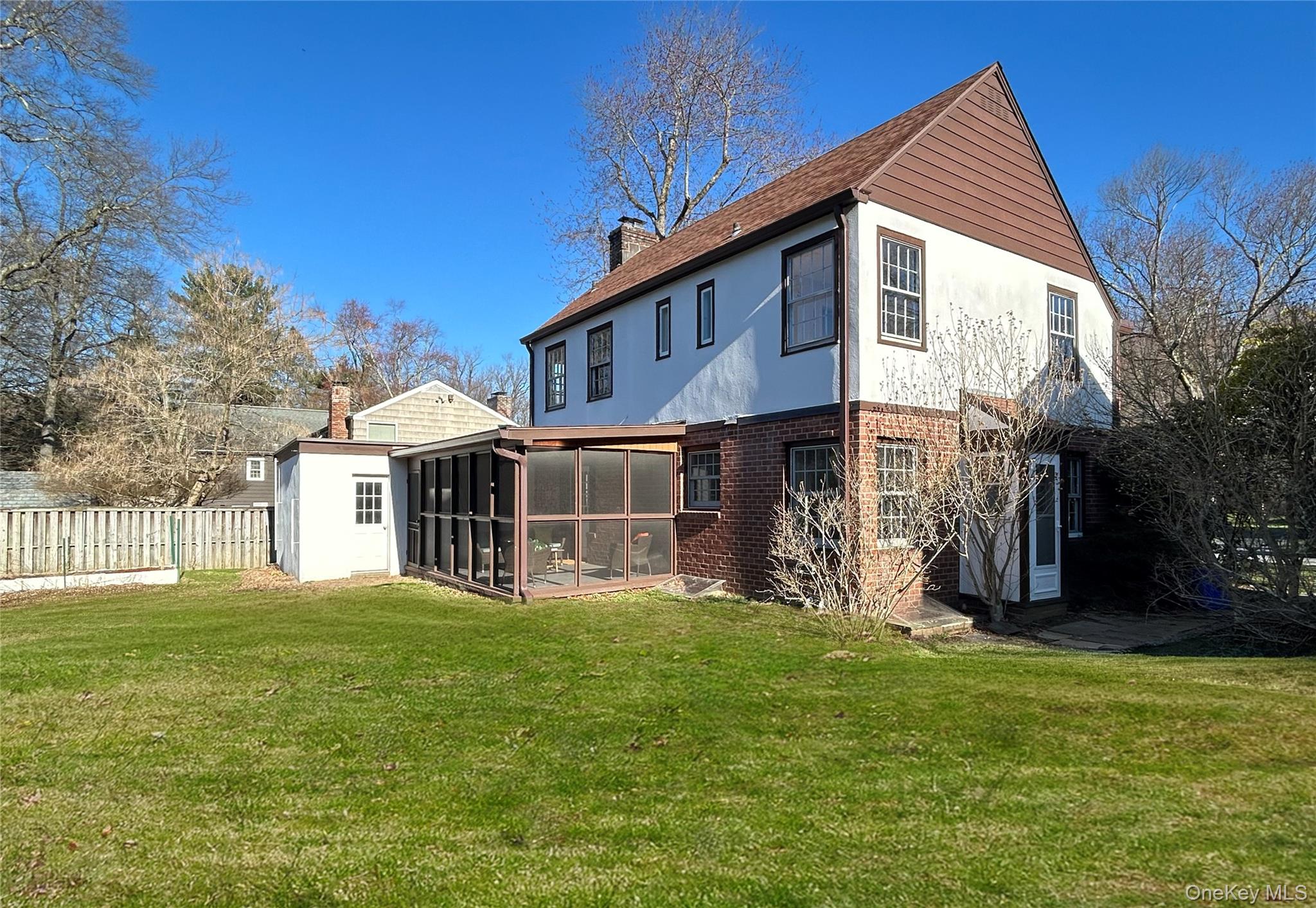 48 Fenwick Road Hastings-on-Hudson, NY 10706 - Photo 39 of 40 a front view of a house with a yard