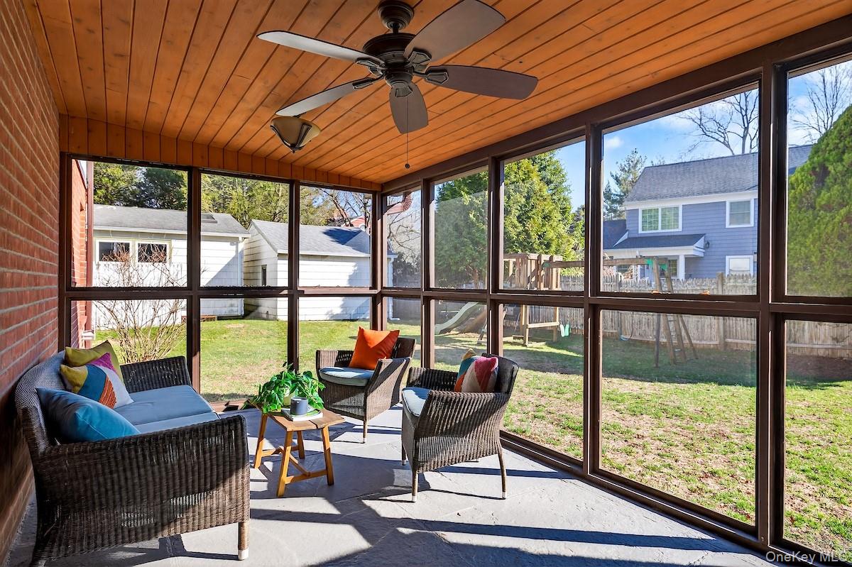 48 Fenwick Road Hastings-on-Hudson, NY 10706 - Photo 6 of 40 a living room with furniture and floor to ceiling windows
