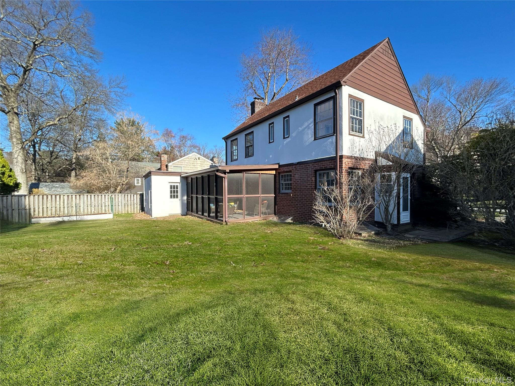 48 Fenwick Road Hastings-on-Hudson, NY 10706 - Photo 9 of 40 a view of a house with a yard