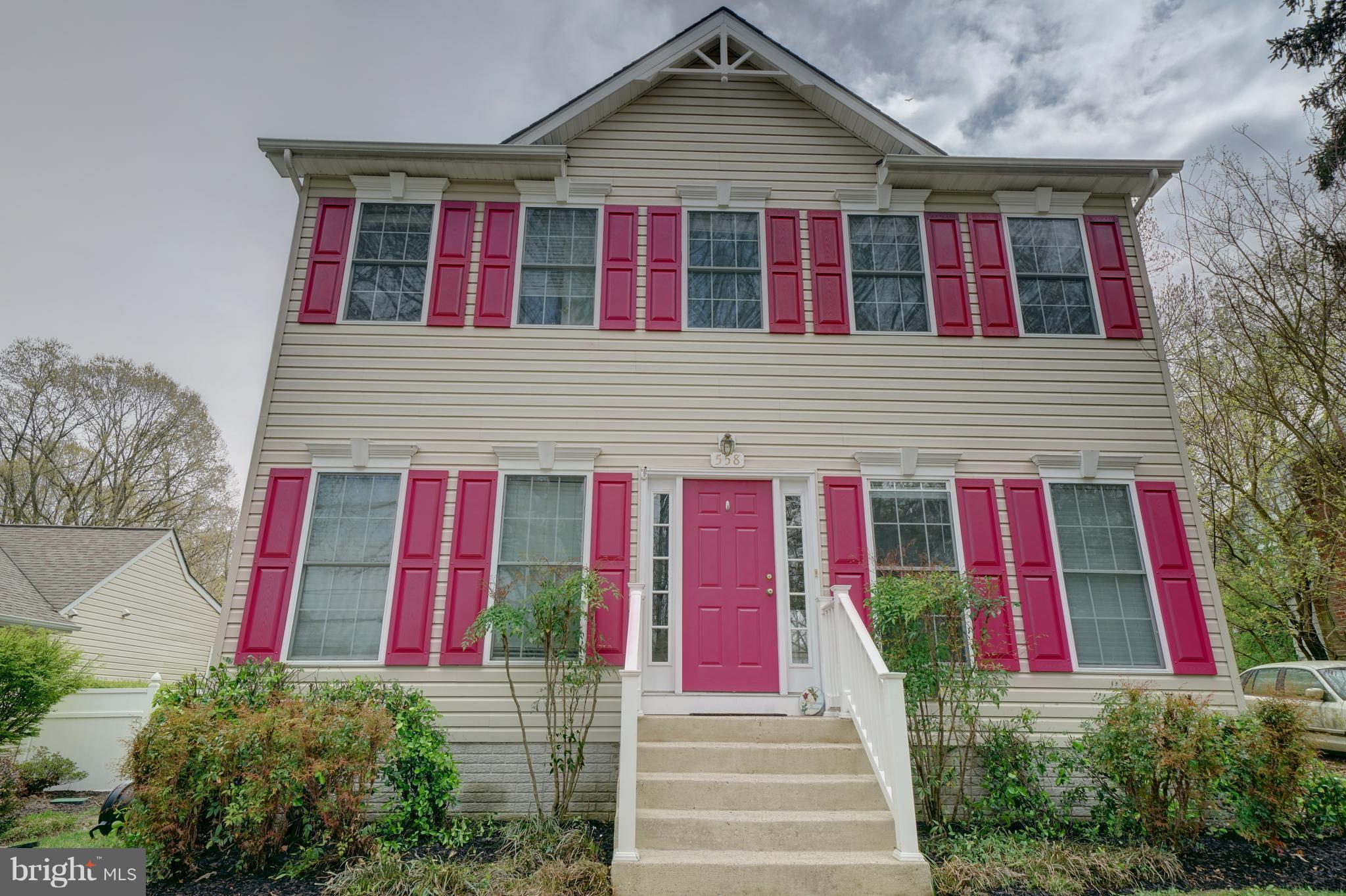 558 Sunset Knoll Road Pasadena, MD 21122 - Photo 1 of 30 a view of a house with small yard and plants
