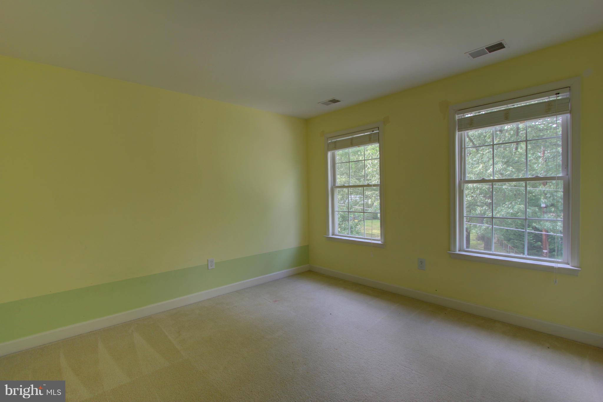 558 Sunset Knoll Road Pasadena, MD 21122 - Photo 23 of 30 an empty room with a window