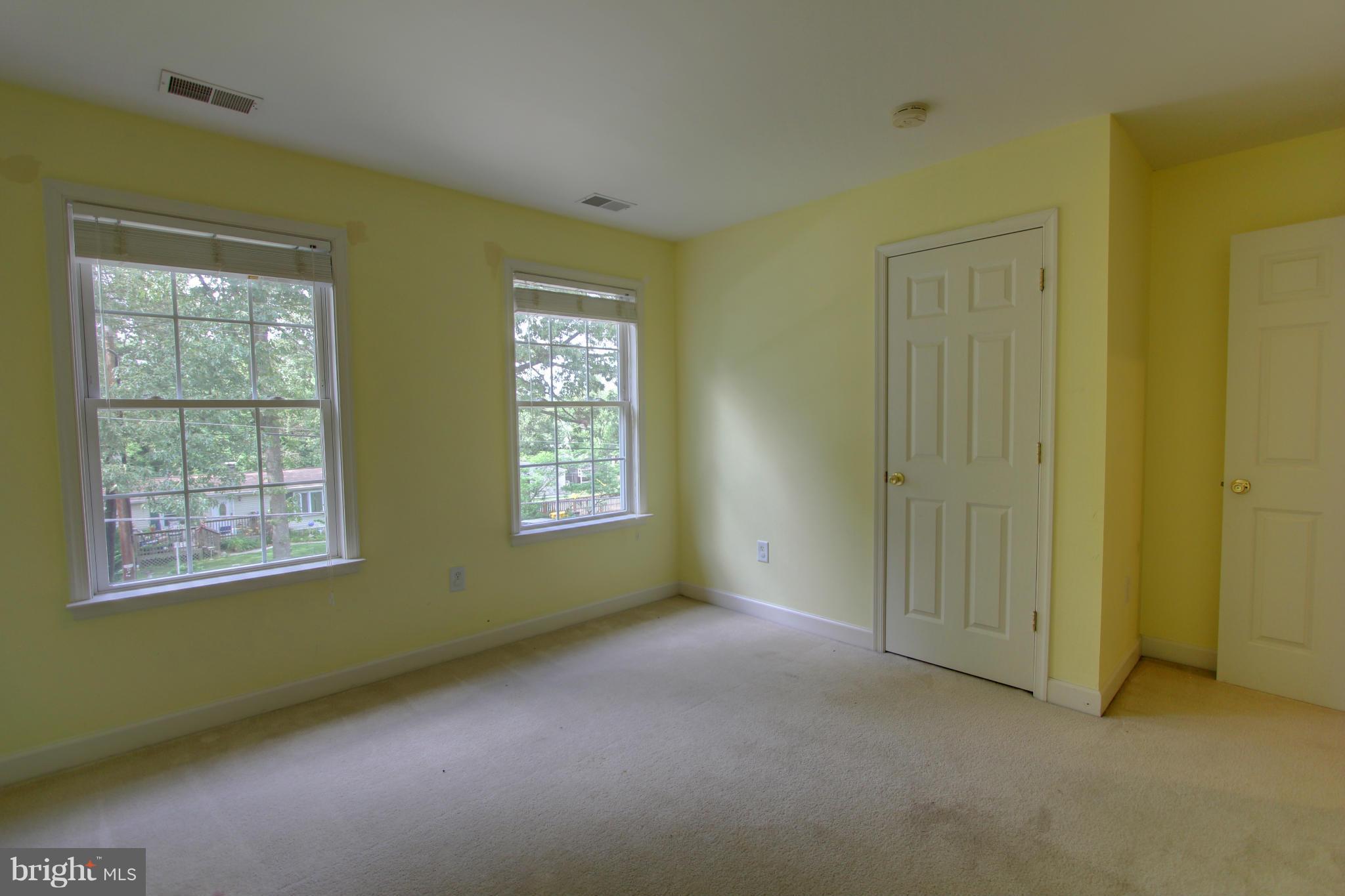 558 Sunset Knoll Road Pasadena, MD 21122 - Photo 24 of 30 an empty room with windows
