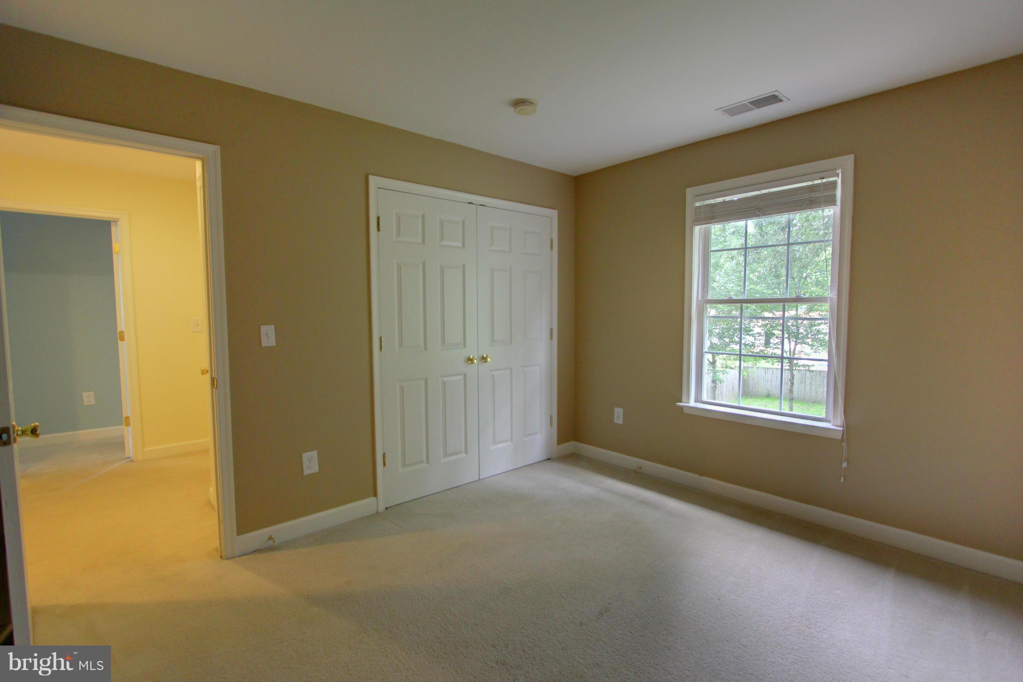 558 Sunset Knoll Road Pasadena, MD 21122 - Photo 27 of 30 a view of an empty room with a window