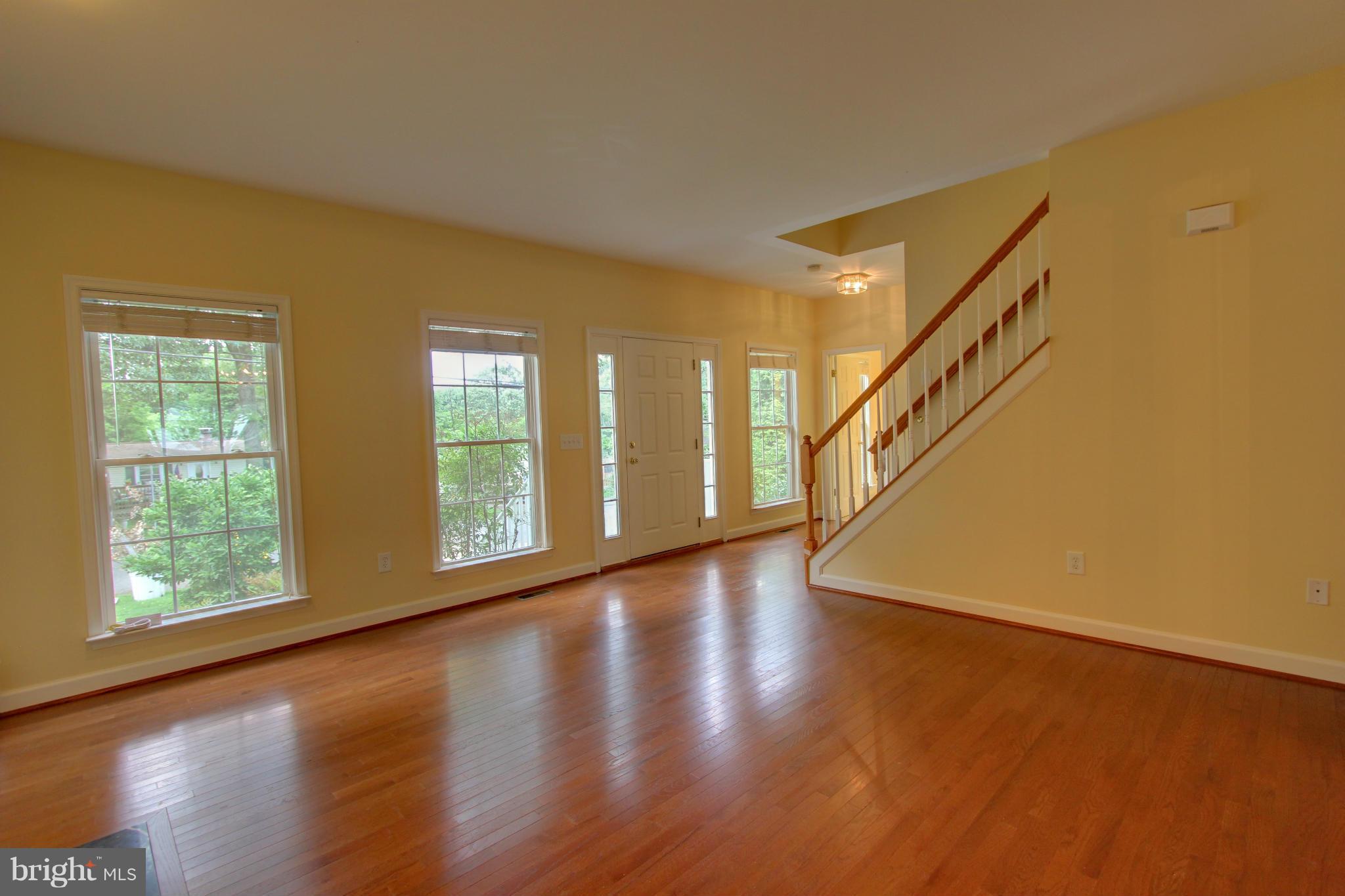 558 Sunset Knoll Road Pasadena, MD 21122 - Photo 8 of 30 a view of an entryway with wooden floor