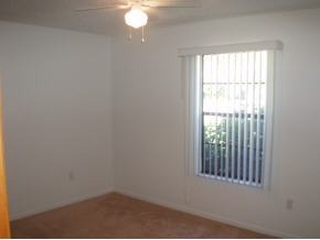 1376 Southeast Ruffin Palm Bay, FL 32909 - Photo 7 of 10 an empty room with a window
