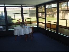 1376 Southeast Ruffin Palm Bay, FL 32909 - Photo 10 of 10 a living room with large windows