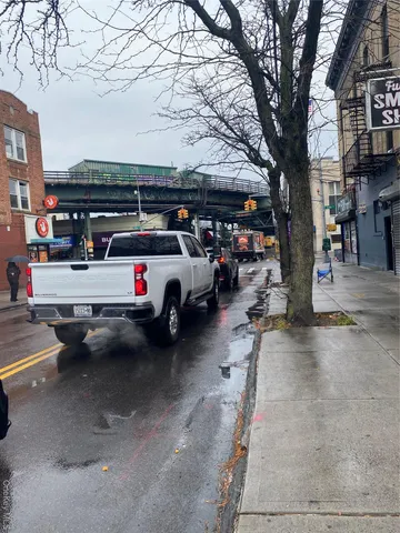 a view of parking with cars parked