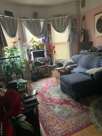 a bedroom with furniture and a fireplace