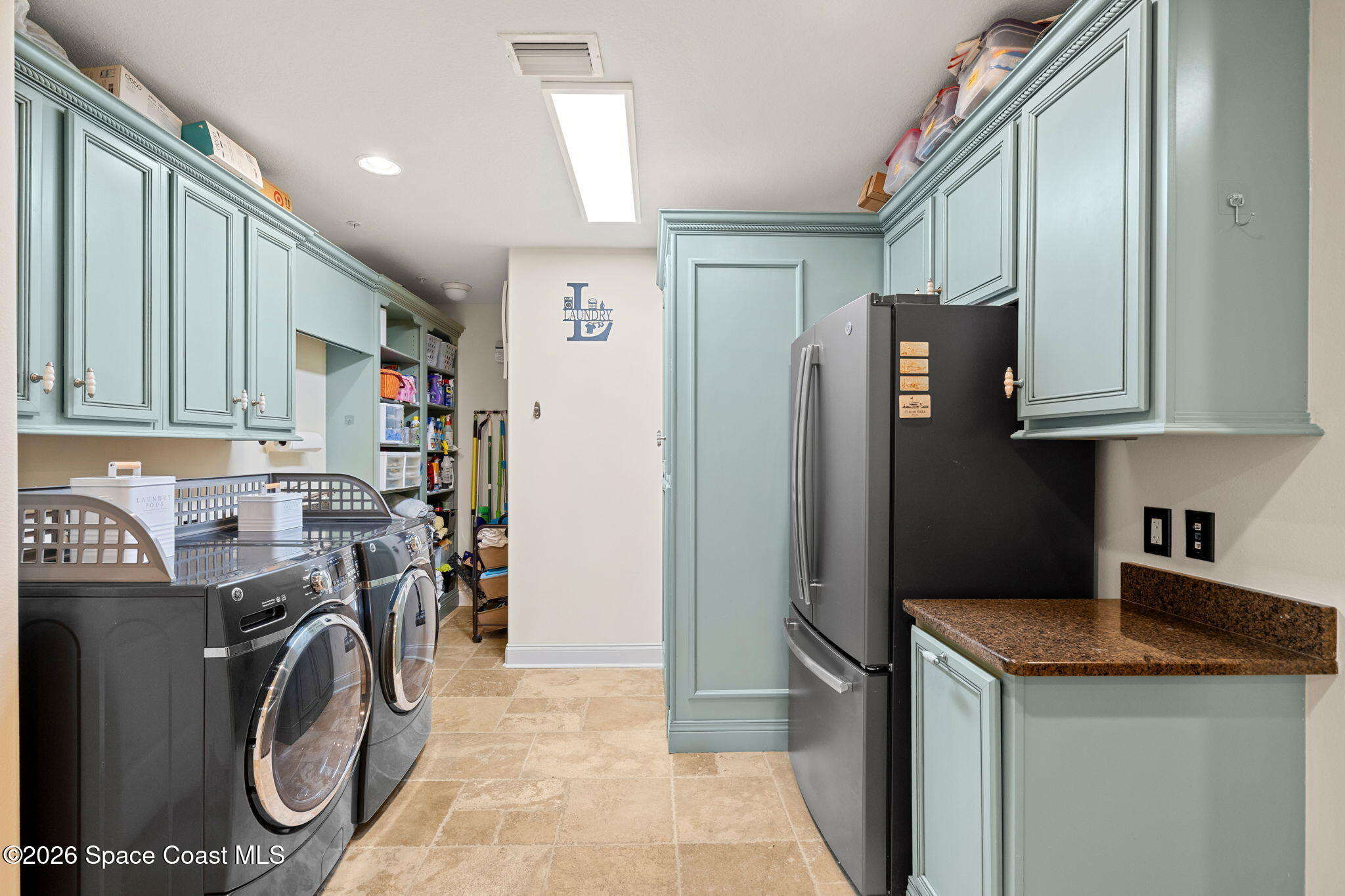 2300 Front Street, Unit 400 Melbourne, FL 32901 - Photo 49 of 78 a utility room with dryer and washer