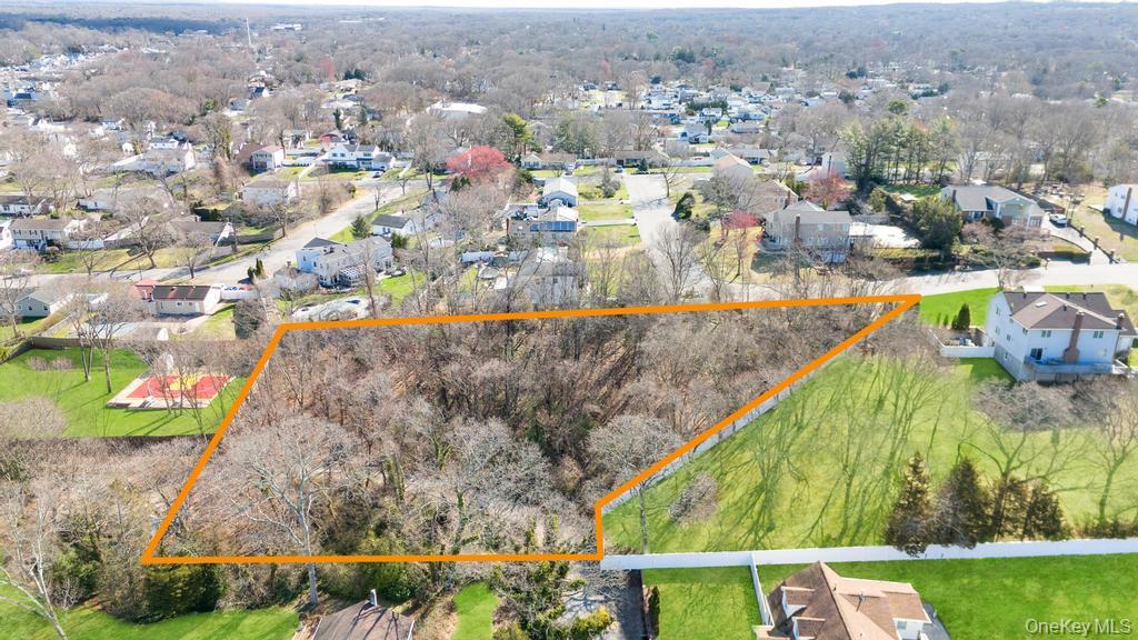 Peconic Street Selden, NY 11784 - Photo 2 of 5 view of outdoor space and garden