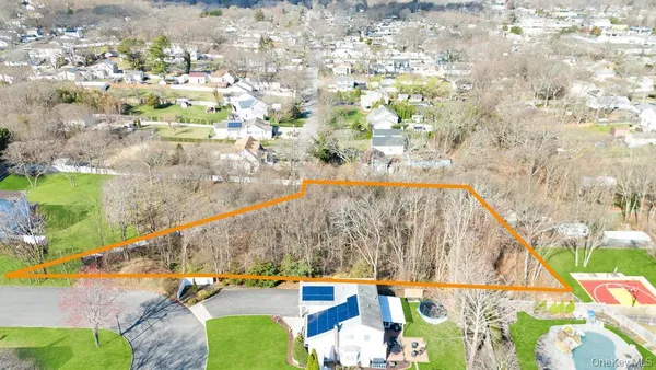 a view of swimming pool with a patio