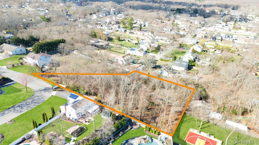 Peconic Street Selden, NY 11784 - Photo 4 of 5 a view of swimming pool with a yard