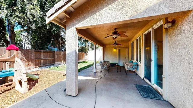 an aerial view of residential houses with outdoor space