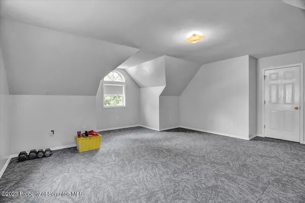 a view of a room with a window