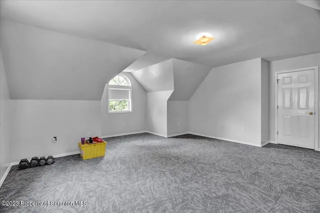 a view of a room with a window