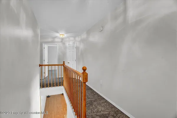 a view of a hallway with entryway