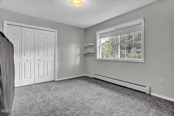 an empty room with a window