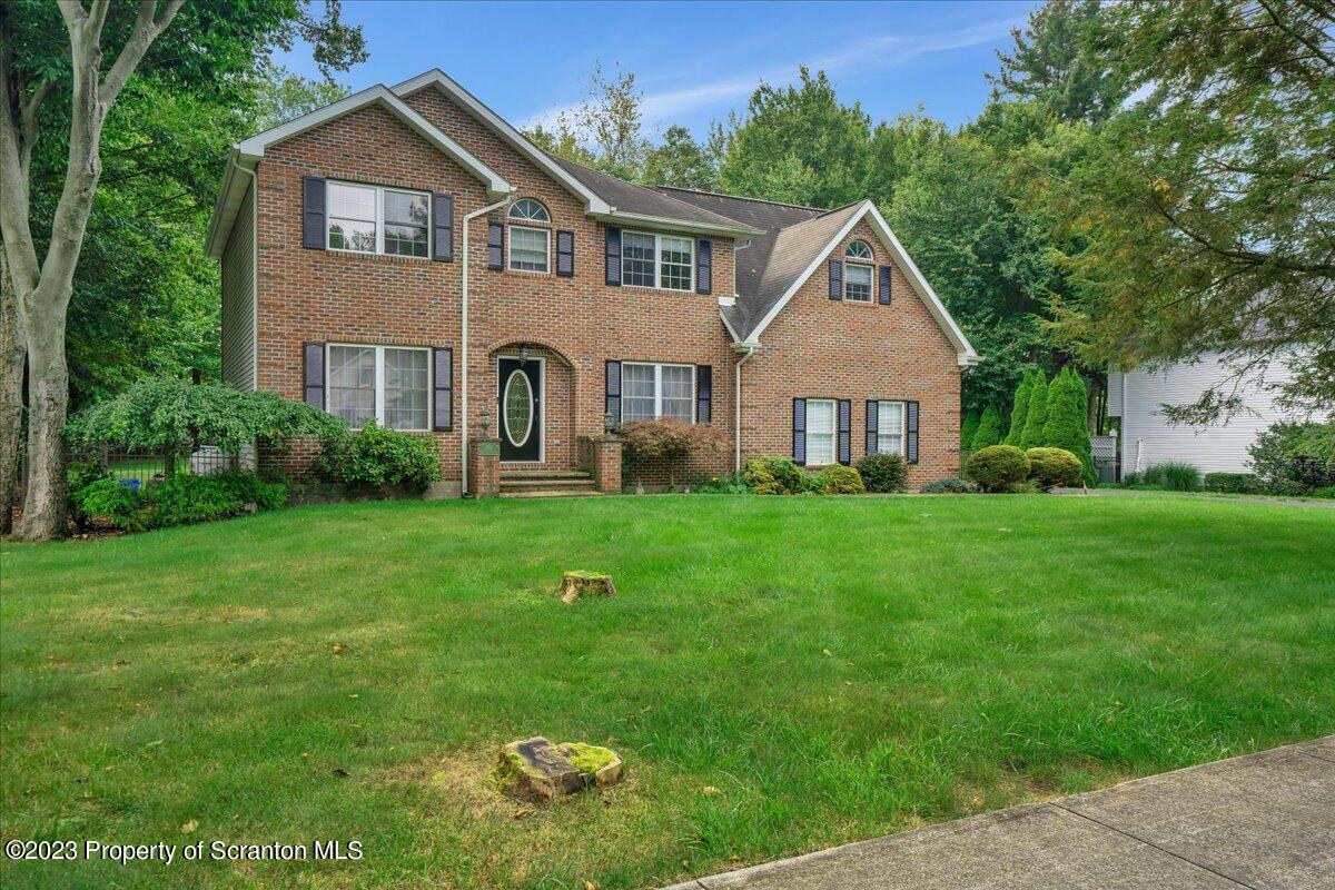 919 Old Logger Road Moscow, PA 18444 - Photo 33 of 36 a front view of house with yard and green space