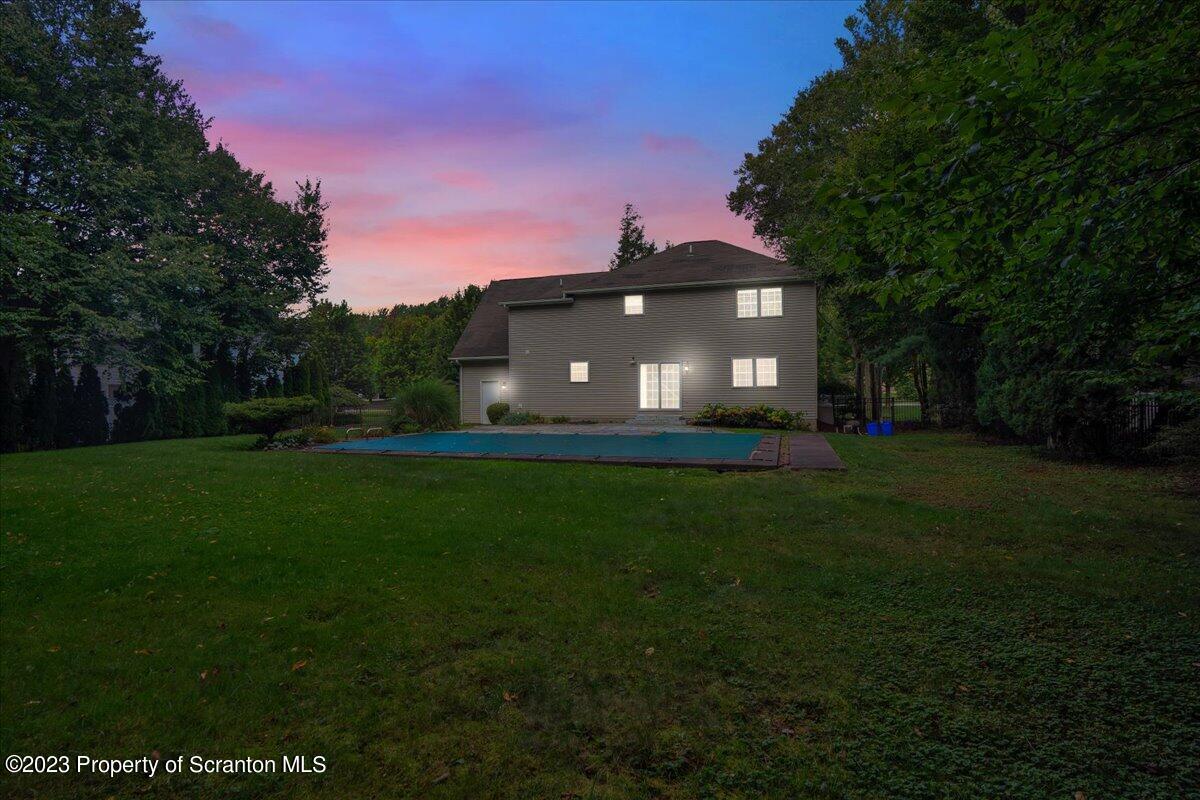 919 Old Logger Road Moscow, PA 18444 - Photo 36 of 36 a front view of a house with garden