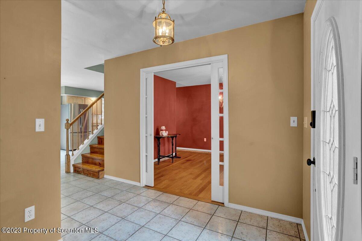 919 Old Logger Road Moscow, PA 18444 - Photo 4 of 36 a view of a hallway view with staircase