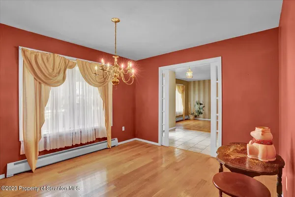 a very nice looking room with a chandelier